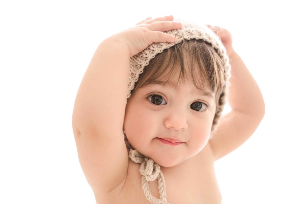 Fotografo neonati e bebè a Verona Trento. Servizio fotografico neonati e bebè. Hunny Pixel fotografia di neonati, bebè, gravidanza e ritratti di famiglia.