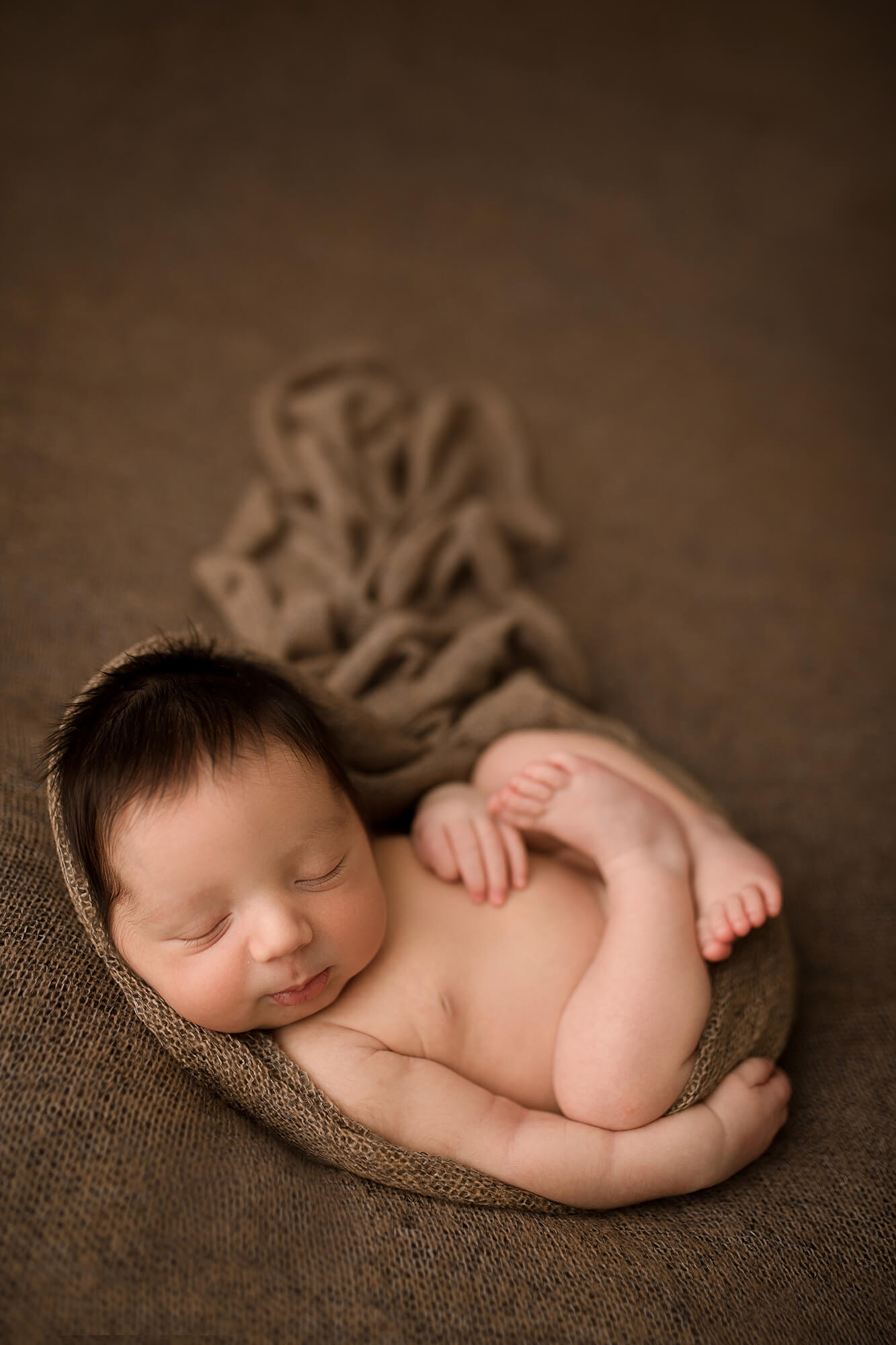 Fotografa newborn neonati a Verona Trento. Servizio fotografico neonati e famiglia. Hunny Pixel fotografia di gravidanza e ritratti di famiglia.